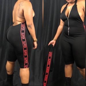 One piece body suit with jacket.